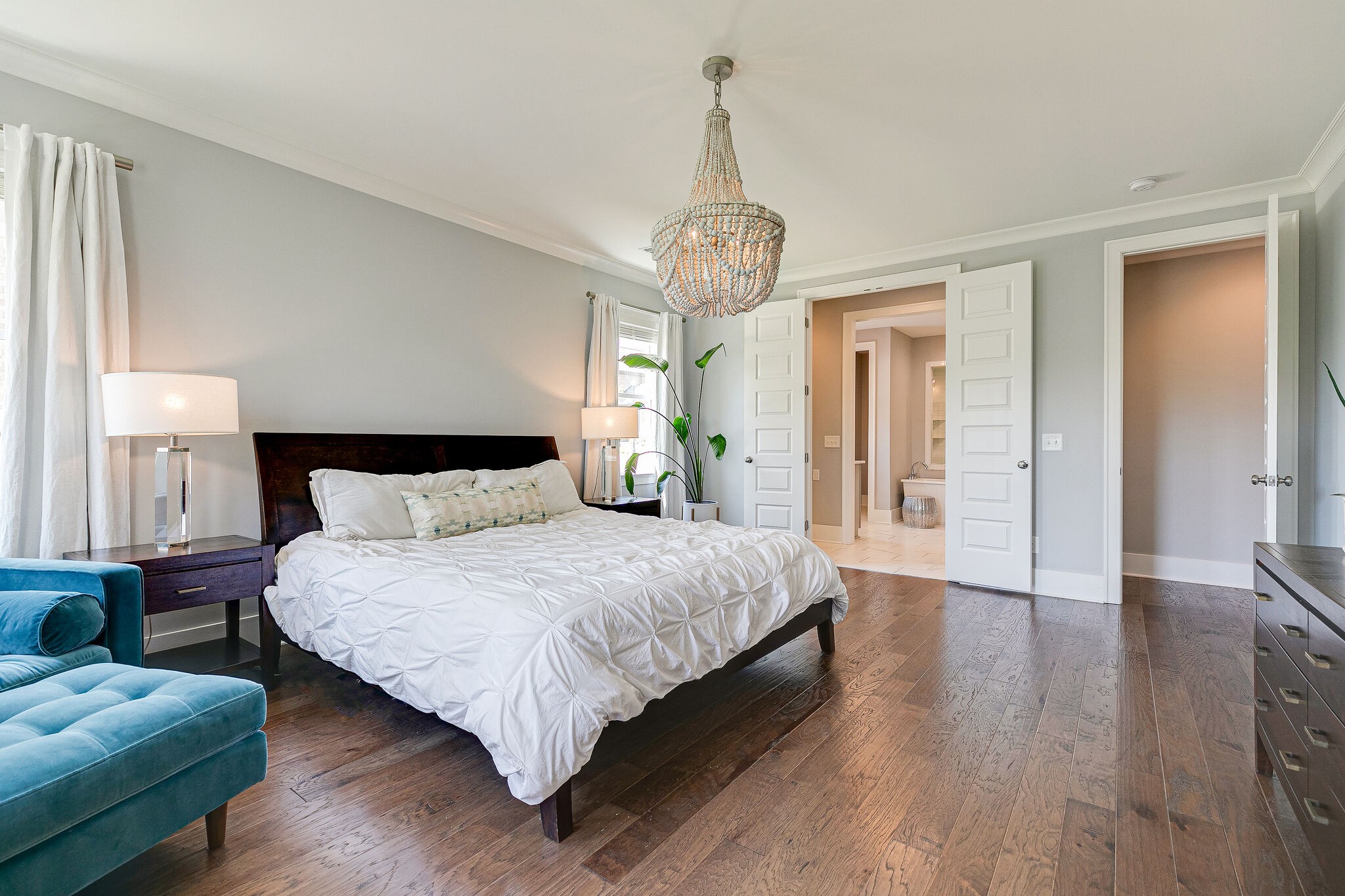 424 Beamon Drive Franklin, TN 37064 - Photo 25 of 52 a spacious bedroom with bed and wooden floor