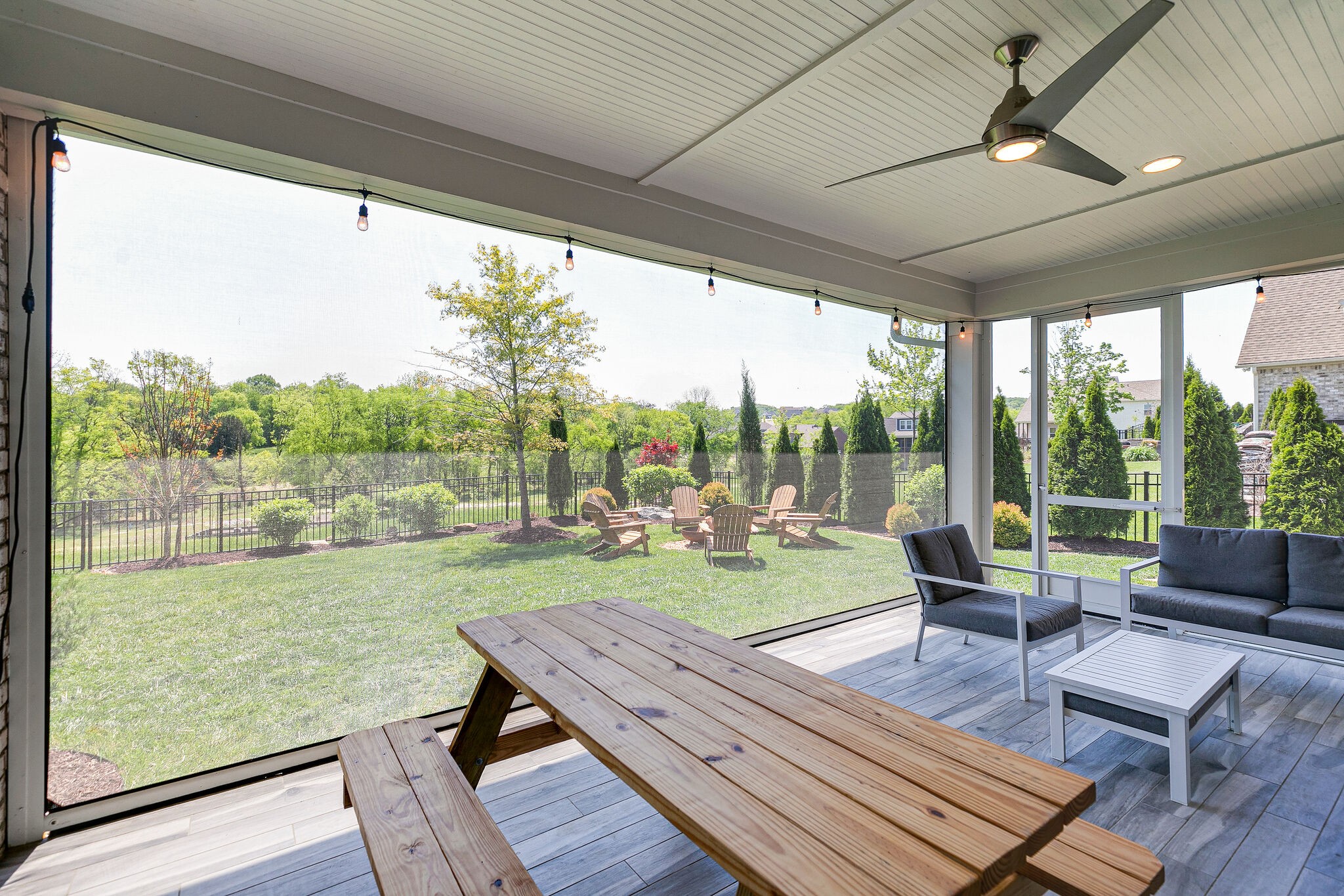 424 Beamon Drive Franklin, TN 37064 - Photo 42 of 52 a view of a porch with furniture and a yard