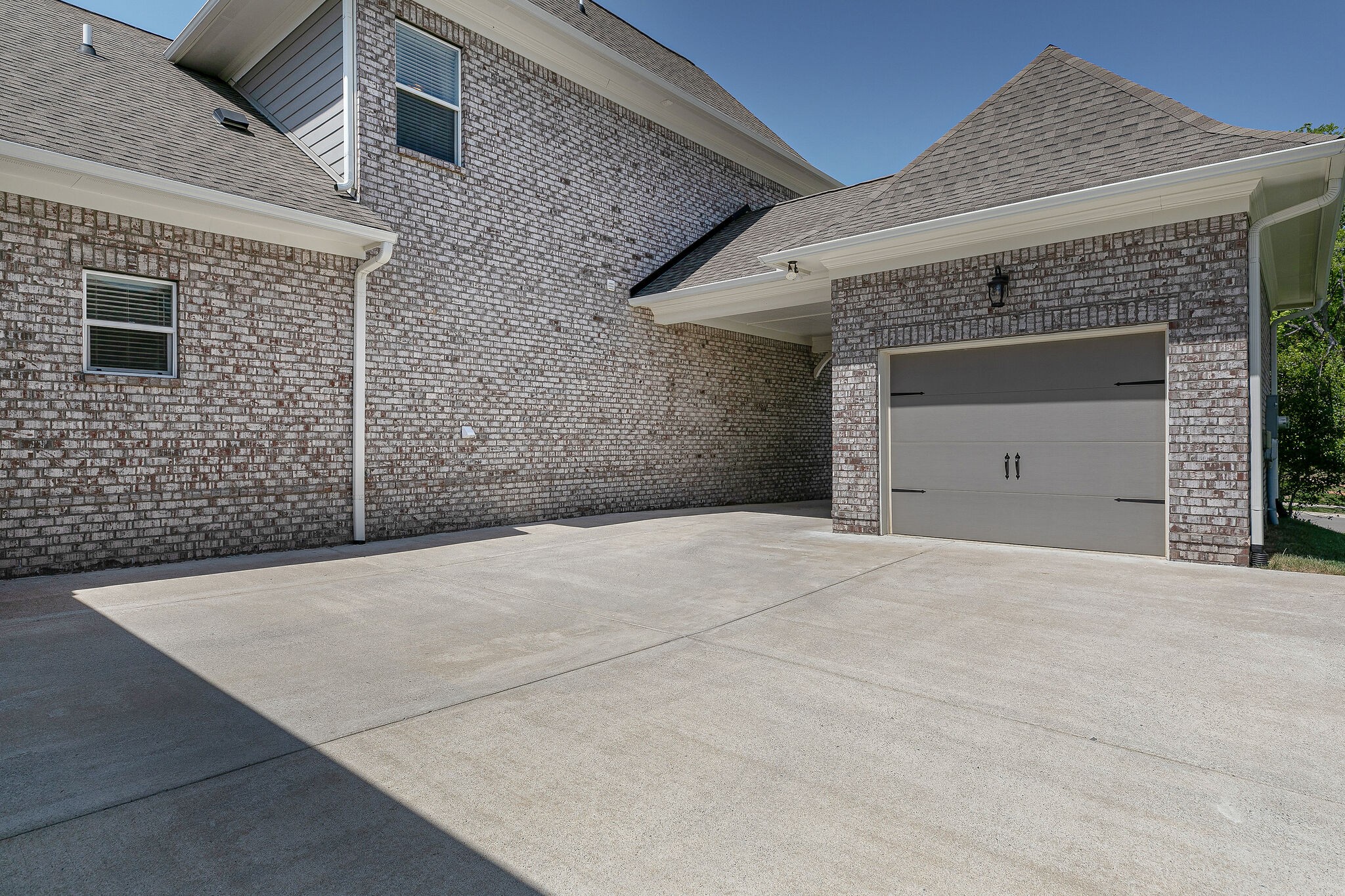424 Beamon Drive Franklin, TN 37064 - Photo 5 of 52 front view of a brick house with a large window