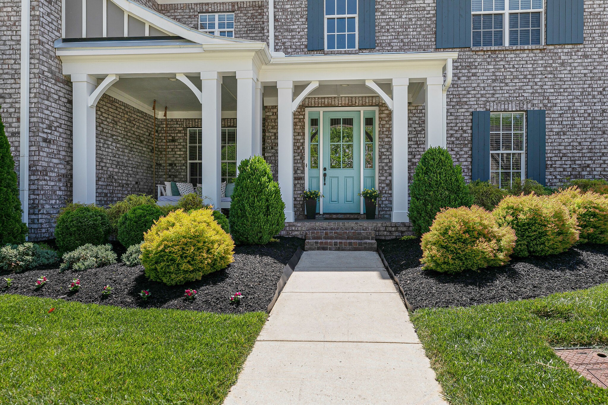 424 Beamon Drive Franklin, TN 37064 - Photo 6 of 52 a front view of a house with garden