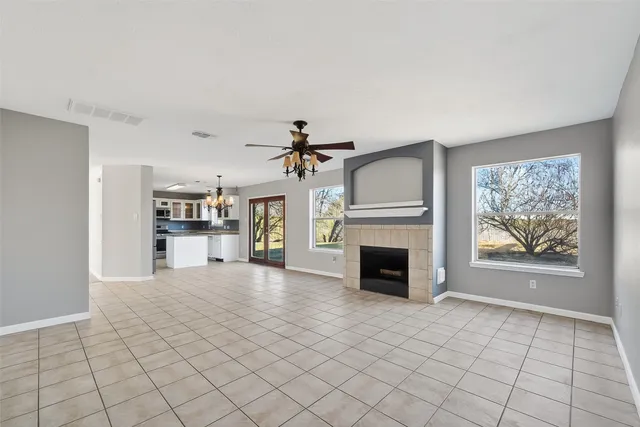 a view of a kitchen with a sink and a window