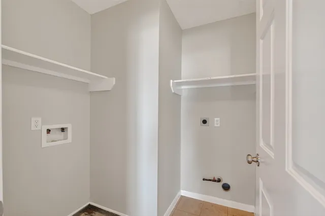 a view of a house with yard and tree s