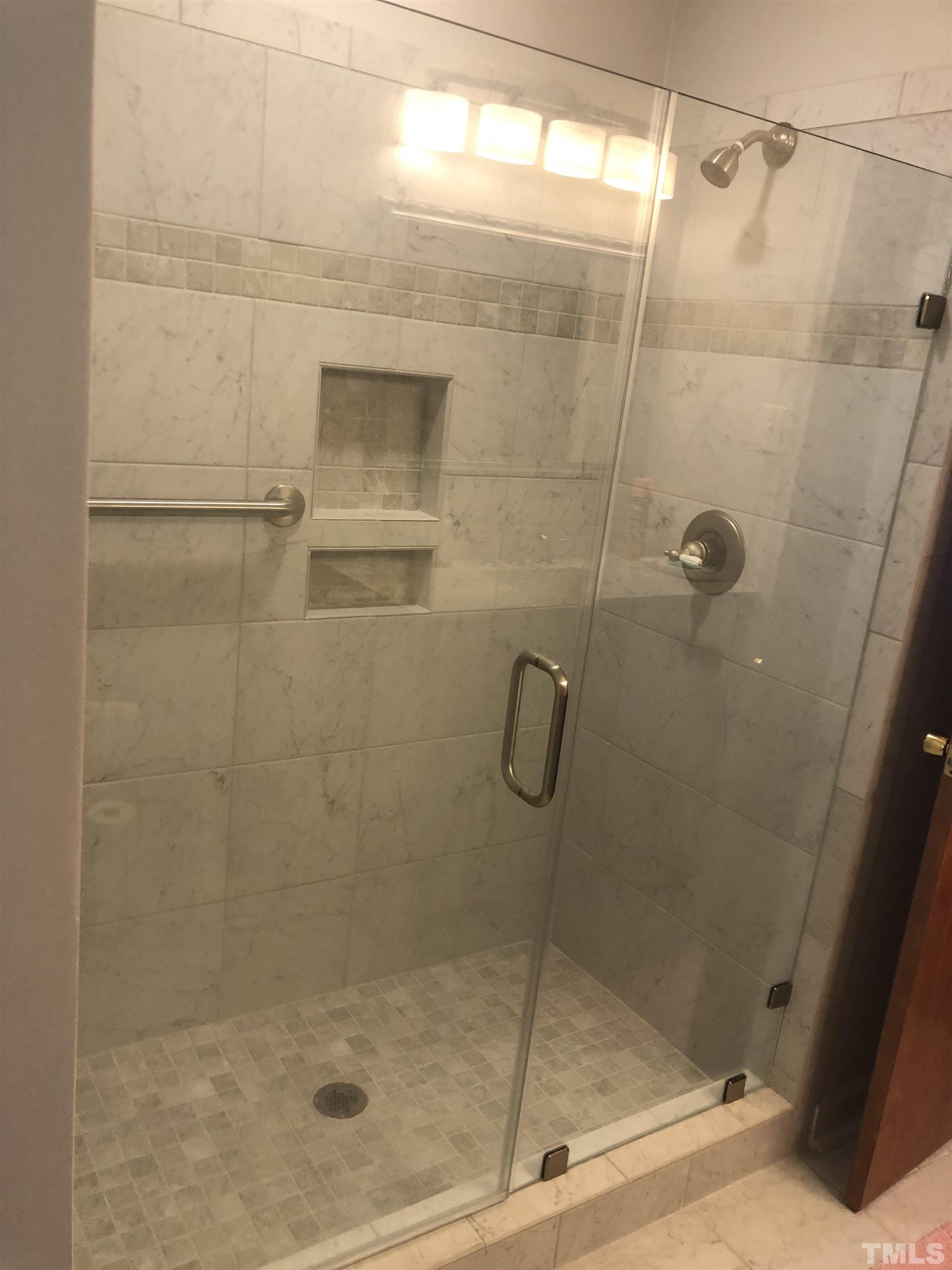 927 Junction Road Durham, NC 27704 - Photo 5 of 22 a bathroom with a shower