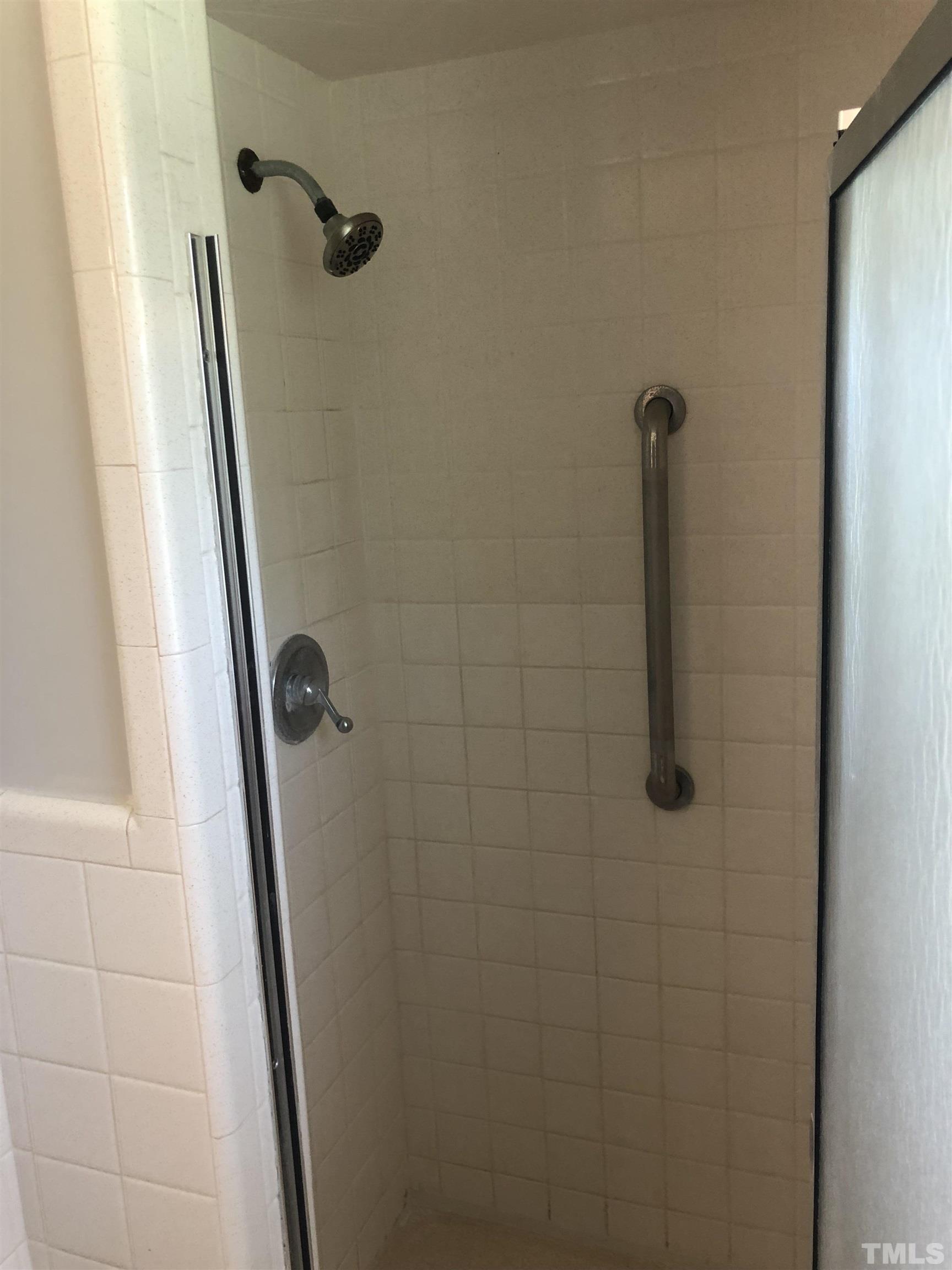 927 Junction Road Durham, NC 27704 - Photo 8 of 22 a bathroom with a shower