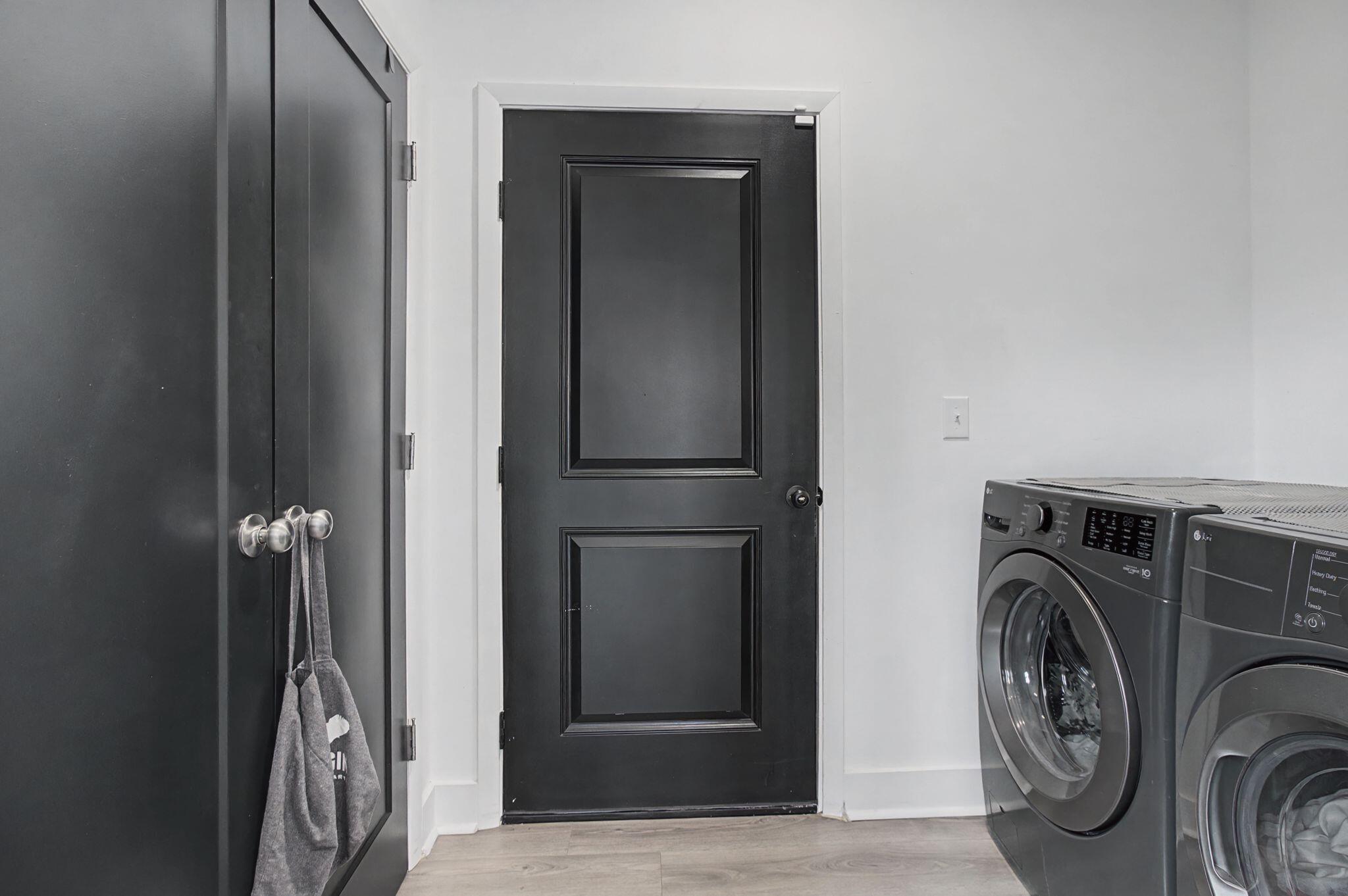 197 West 1st Avenue Crestview, FL 32536 - Photo 13 of 32 a view of a storage & utility room with washer and dryer