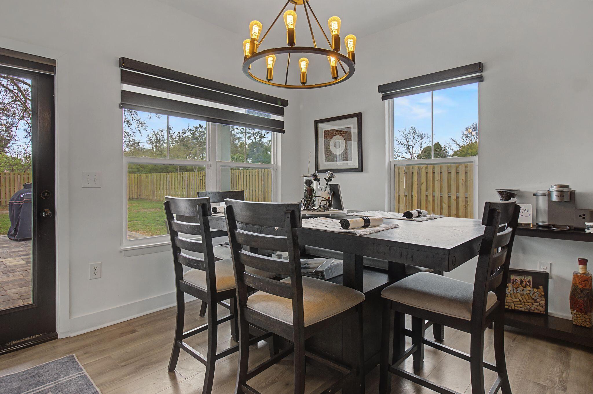 197 West 1st Avenue Crestview, FL 32536 - Photo 15 of 32 a view of a dining room with furniture window and outside view