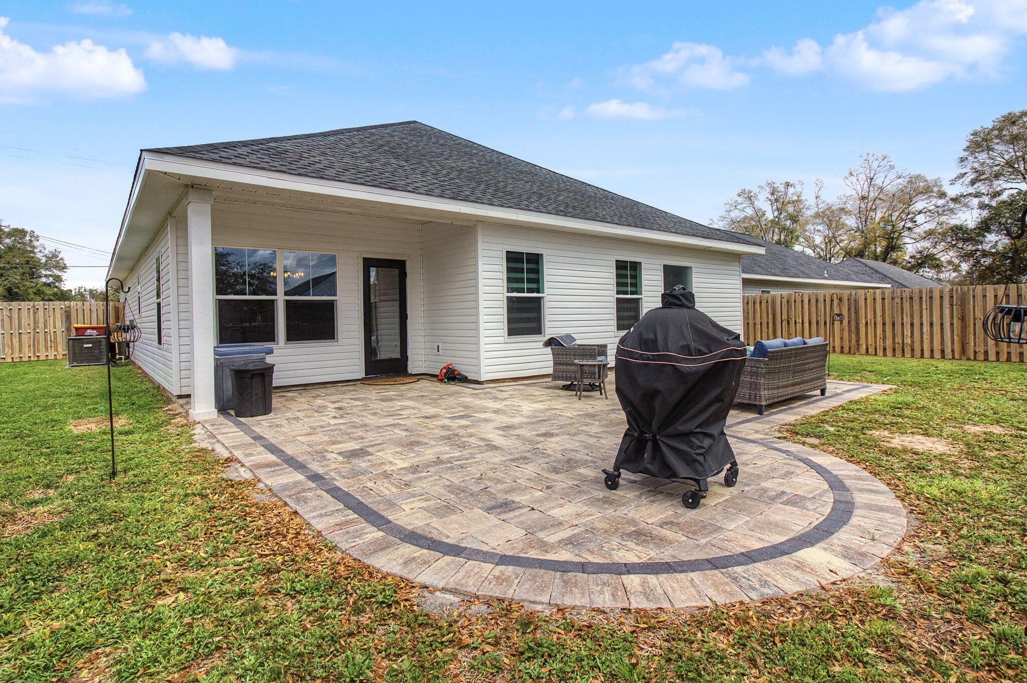 197 West 1st Avenue Crestview, FL 32536 - Photo 26 of 32 a house view with a garden space