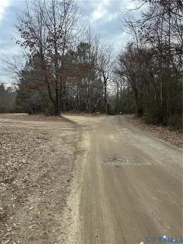 a view of empty room with trees