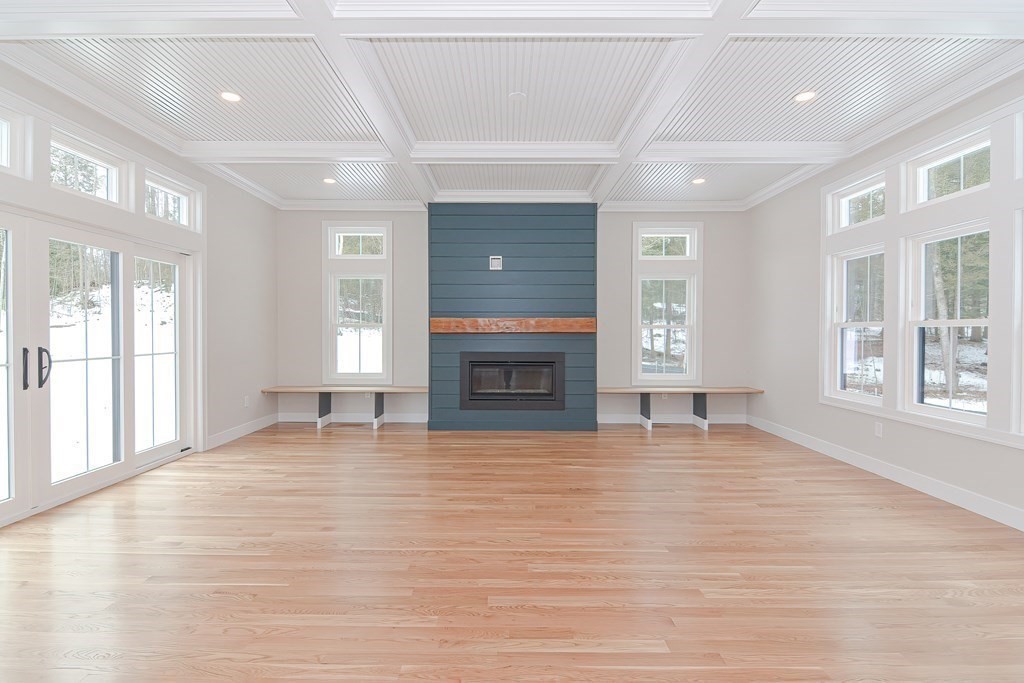 Lot 7 Maple Avenue Groton, MA 01450 - Photo 11 of 42 a view of an empty room with a window and fireplace