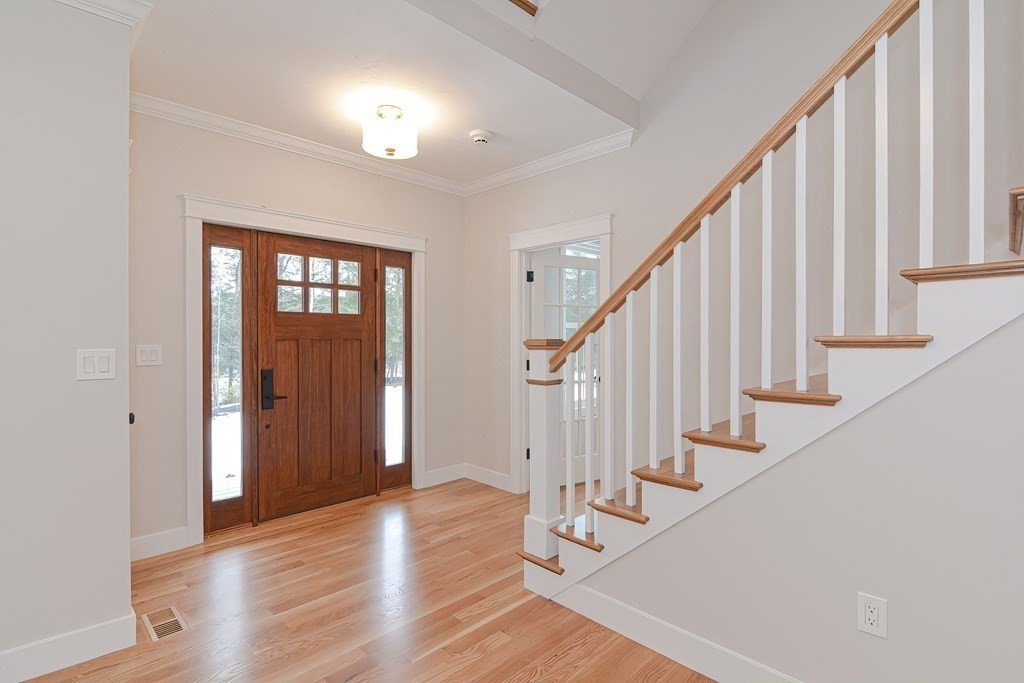 Lot 7 Maple Avenue Groton, MA 01450 - Photo 17 of 42 a view of entryway and hall with wooden floor