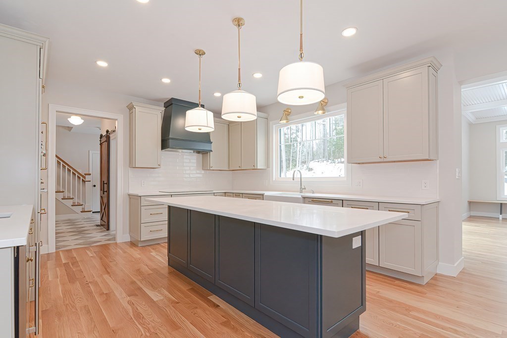 Lot 7 Maple Avenue Groton, MA 01450 - Photo 7 of 42 a large kitchen with a lot of counter space and a sink