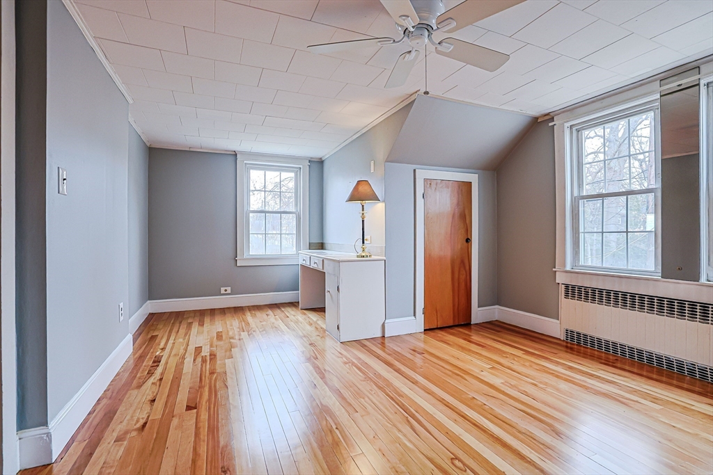 9 Russ Street Methuen, MA 01844 - Photo 20 of 37 a view of a livingroom with wooden floor and a window