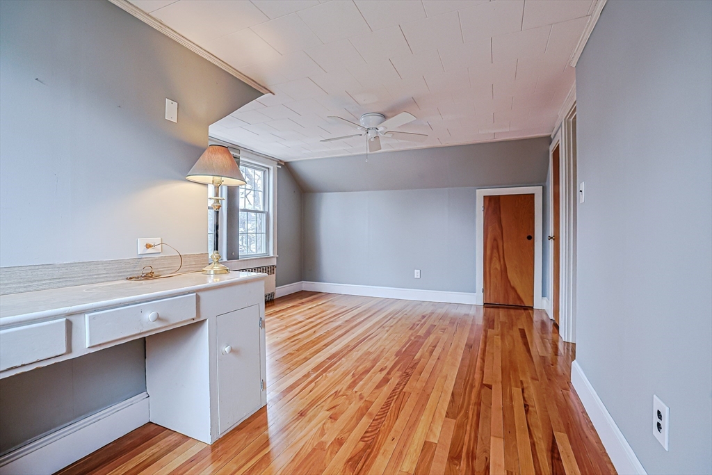 9 Russ Street Methuen, MA 01844 - Photo 21 of 37 wooden floor in an empty room with a window