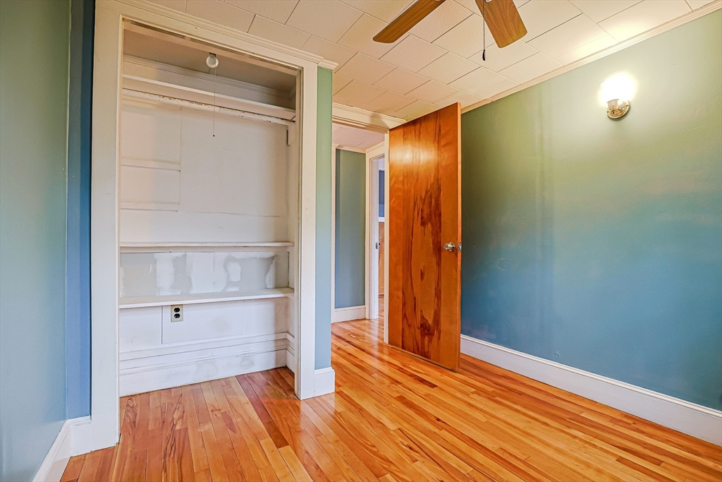 9 Russ Street Methuen, MA 01844 - Photo 23 of 37 a view of empty room with wooden floor