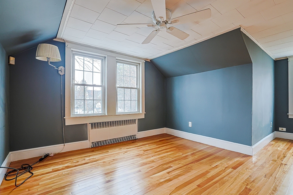 9 Russ Street Methuen, MA 01844 - Photo 24 of 37 a view of empty room with wooden floor and fan