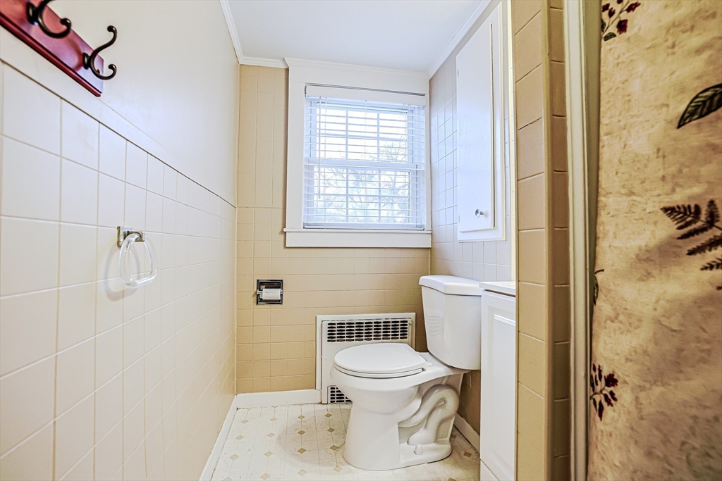 9 Russ Street Methuen, MA 01844 - Photo 26 of 37 a bathroom with a toilet and a shower