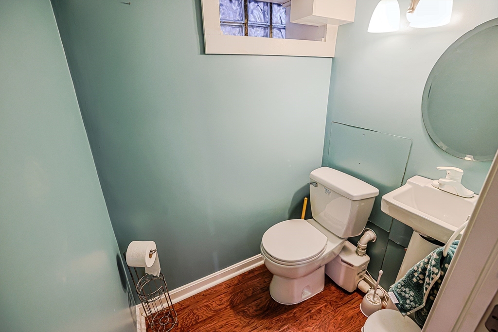 9 Russ Street Methuen, MA 01844 - Photo 28 of 37 a white toilet sitting next to a shower