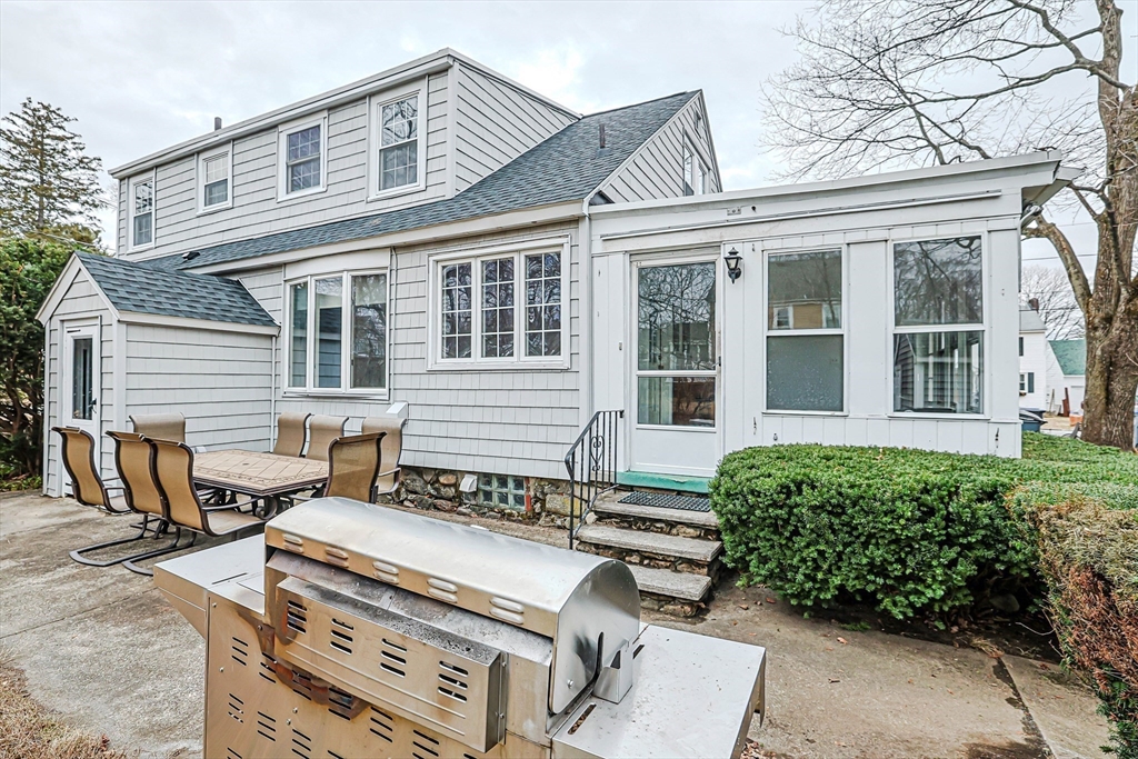 9 Russ Street Methuen, MA 01844 - Photo 35 of 37 front view of a house with a bench