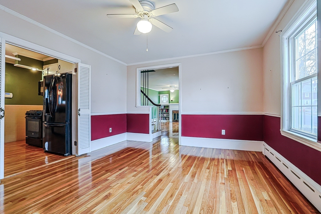 9 Russ Street Methuen, MA 01844 - Photo 8 of 37 a living room with furniture and wooden floor