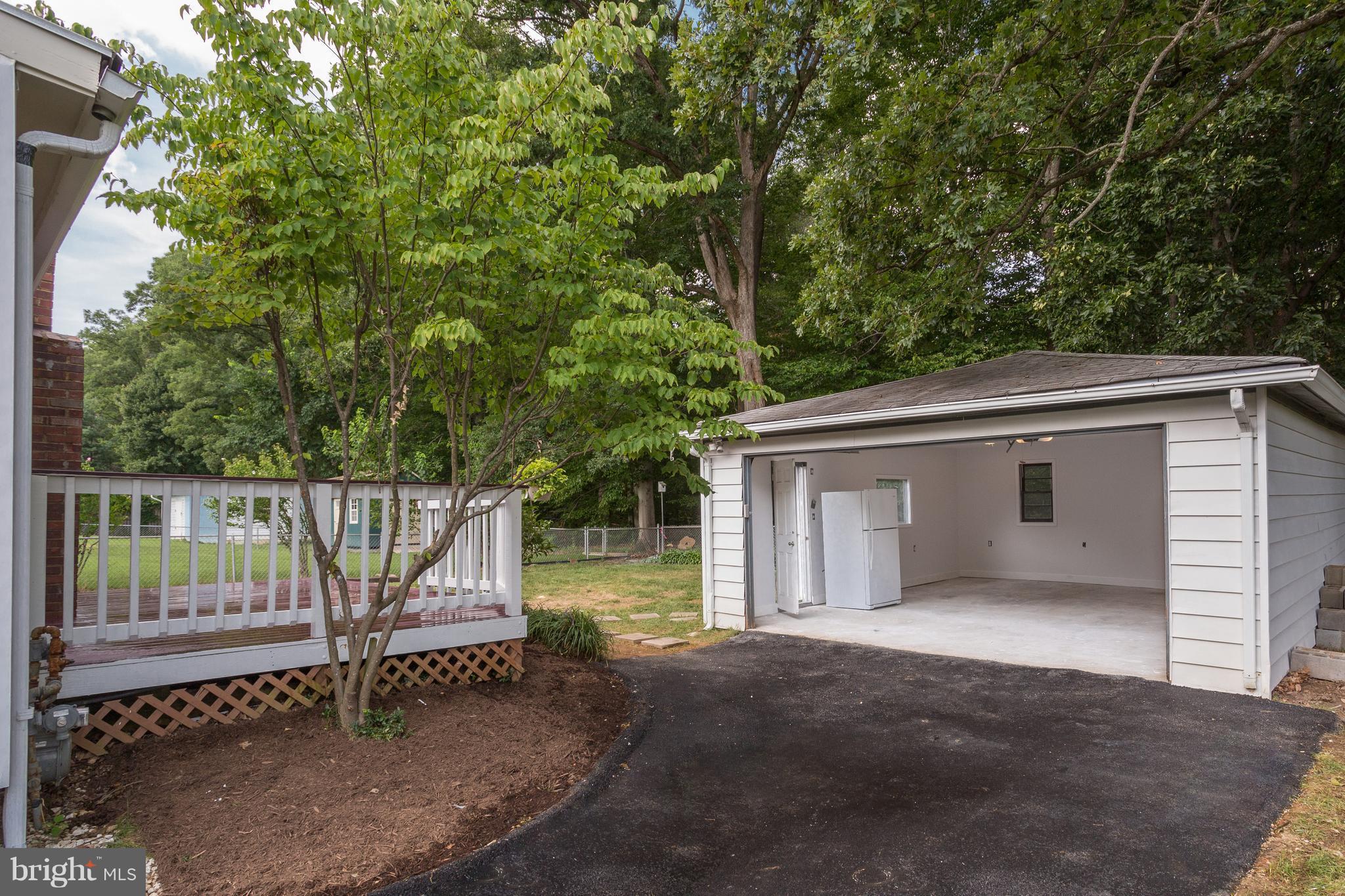 7017 Quander Road Alexandria, VA 22307 - Photo 30 of 30 a house view with a backyard space