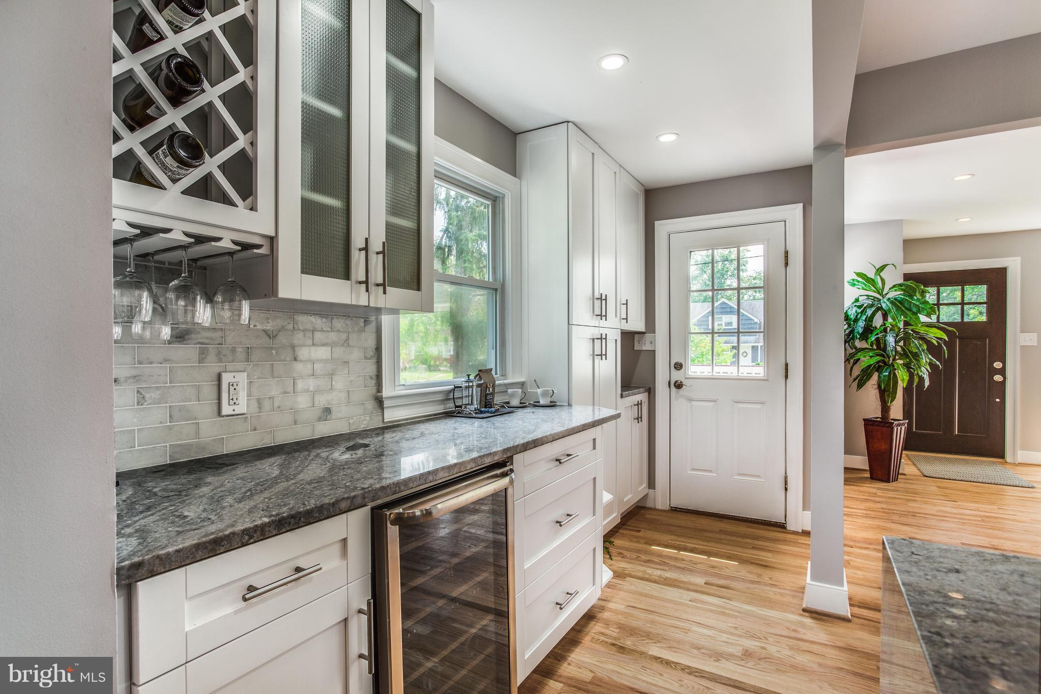 7017 Quander Road Alexandria, VA 22307 - Photo 10 of 30 a kitchen with a sink and cabinets