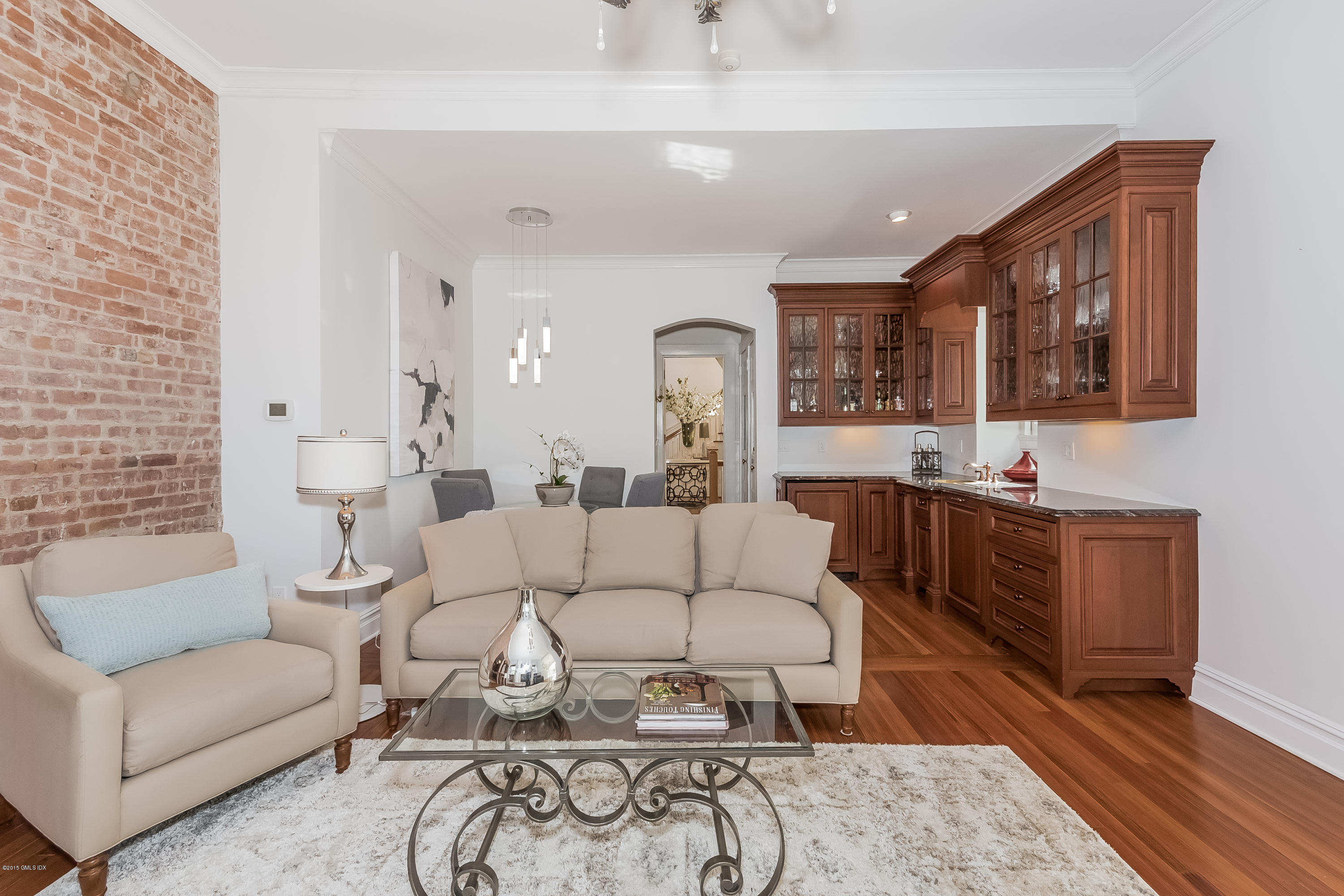 432 Field Point Road Greenwich, CT 06830 - Photo 11 of 25 a living room with furniture kitchen view and a window