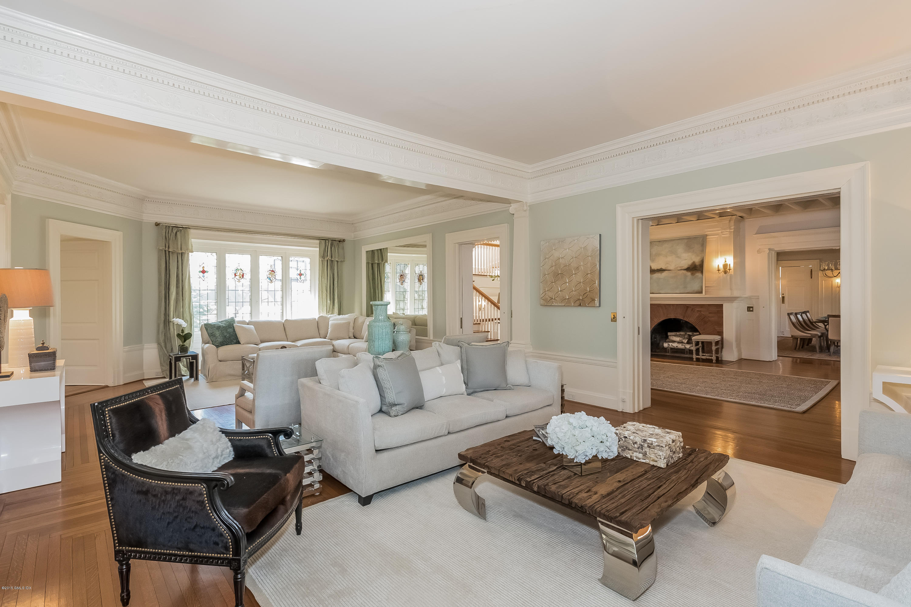 432 Field Point Road Greenwich, CT 06830 - Photo 8 of 25 a living room with furniture and a fireplace