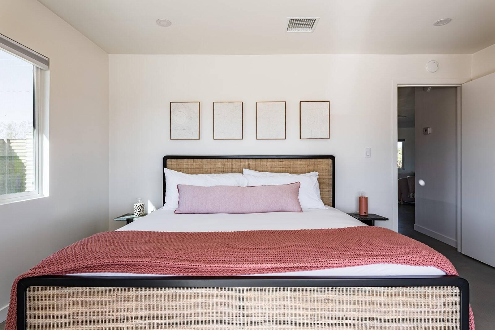 55717 Ruth Lane Yucca Valley, CA 92284 - Photo 25 of 32 a bedroom with a bed and a window