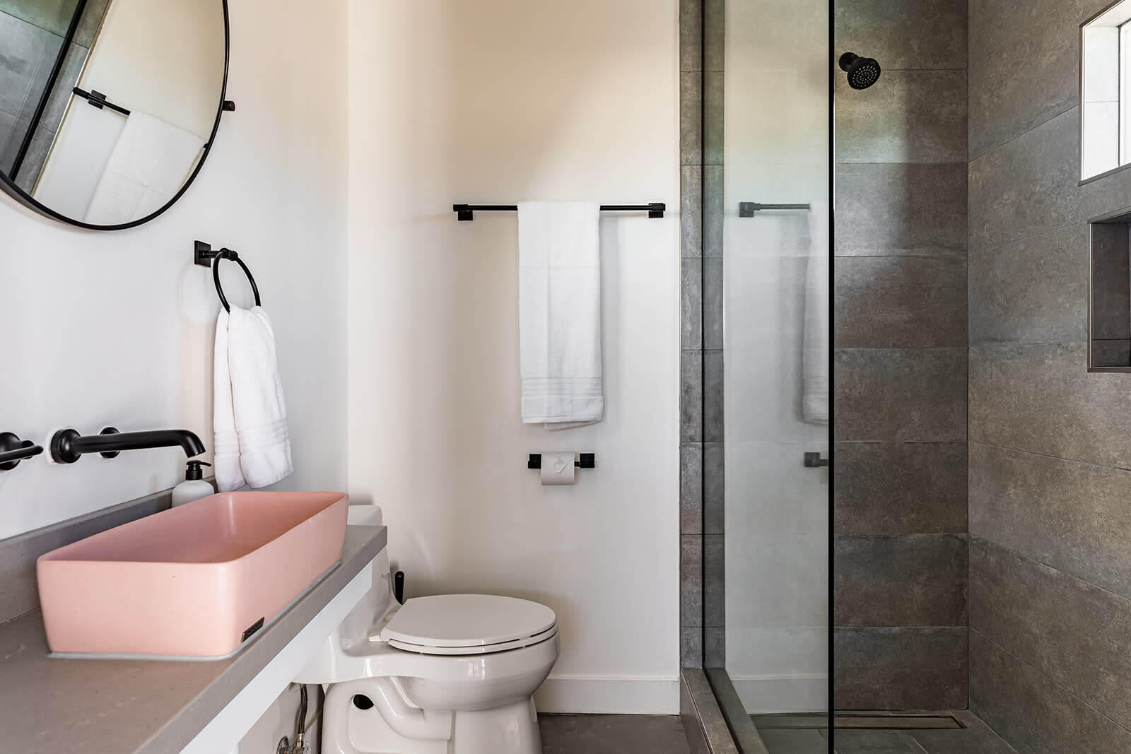 55717 Ruth Lane Yucca Valley, CA 92284 - Photo 27 of 32 a bathroom with a toilet and a shower