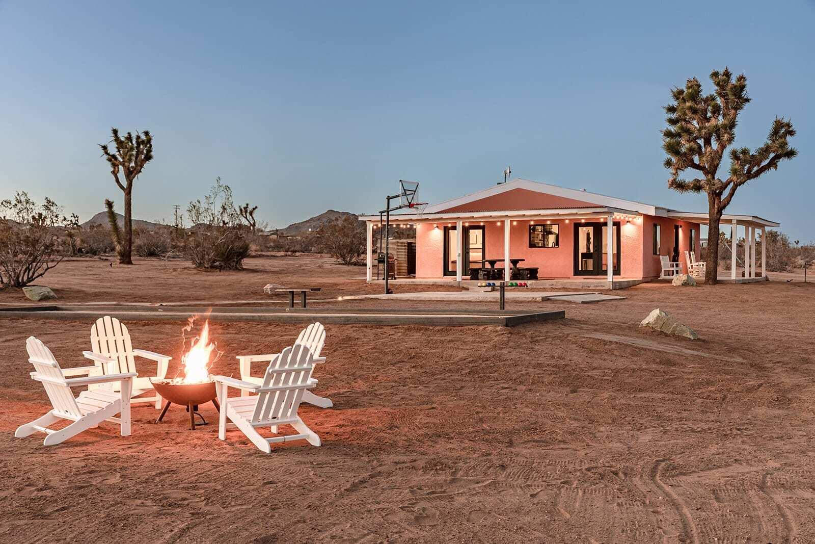55717 Ruth Lane Yucca Valley, CA 92284 - Photo 7 of 32 a outdoor space with lots of white furniture