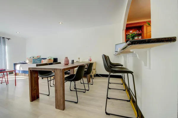 a view of a workspace with furniture