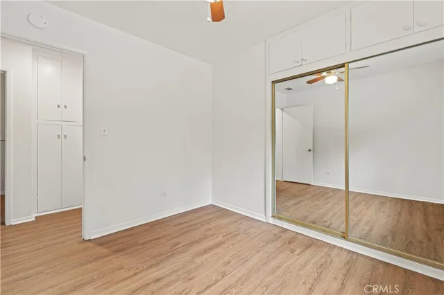 a bathroom with a sink a toilet and vanity