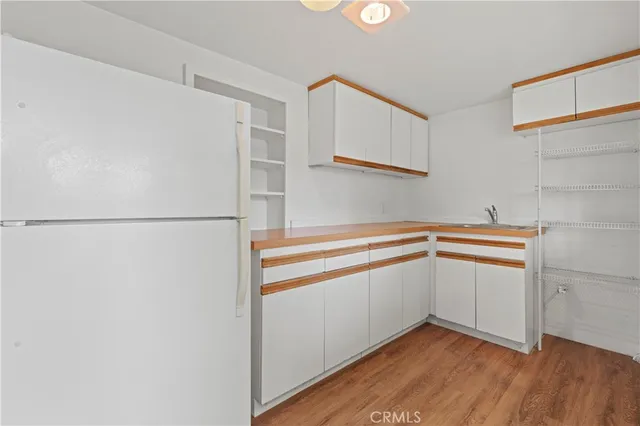 a storage room with wooden floor