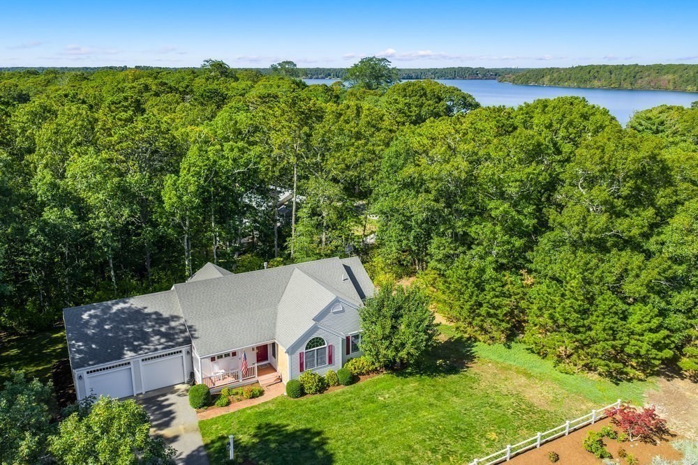 3 Stephen Hopkins Road Harwich, MA 02645 - Photo 1 of 42 an aerial view of a house with yard and outdoor seating