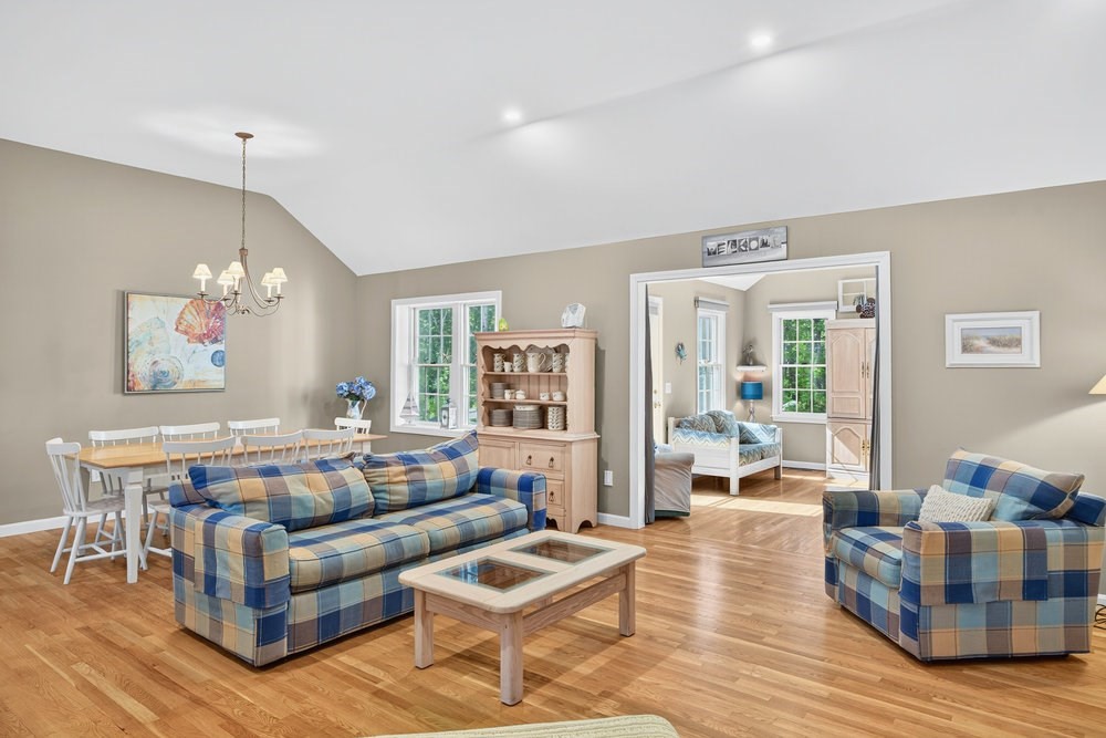 3 Stephen Hopkins Road Harwich, MA 02645 - Photo 11 of 42 a living room with furniture and wooden floor
