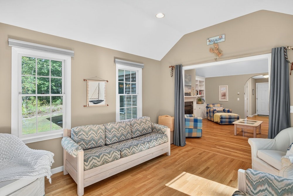3 Stephen Hopkins Road Harwich, MA 02645 - Photo 14 of 42 a living room with furniture and a large window