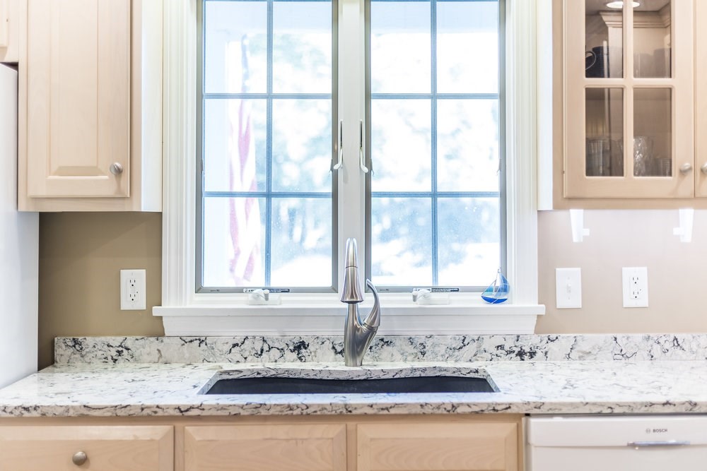 3 Stephen Hopkins Road Harwich, MA 02645 - Photo 20 of 42 a bathroom with a granite countertop sink and a window