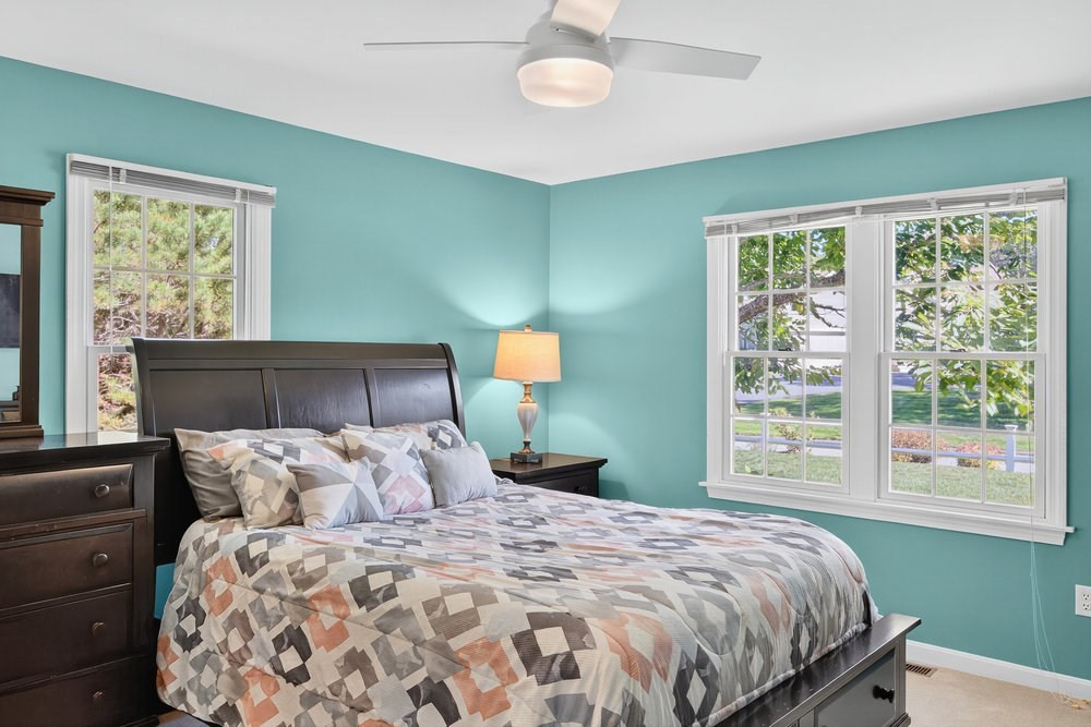 3 Stephen Hopkins Road Harwich, MA 02645 - Photo 26 of 42 a bedroom with a large bed and a window