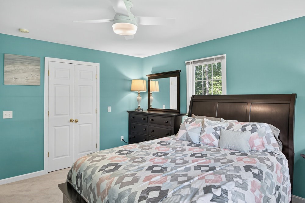 3 Stephen Hopkins Road Harwich, MA 02645 - Photo 27 of 42 a bedroom with a large bed and a window