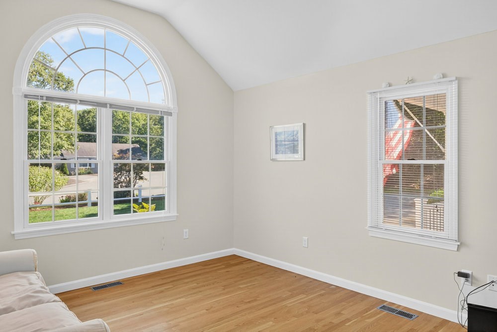 3 Stephen Hopkins Road Harwich, MA 02645 - Photo 28 of 42 wooden floor in an empty room with a window