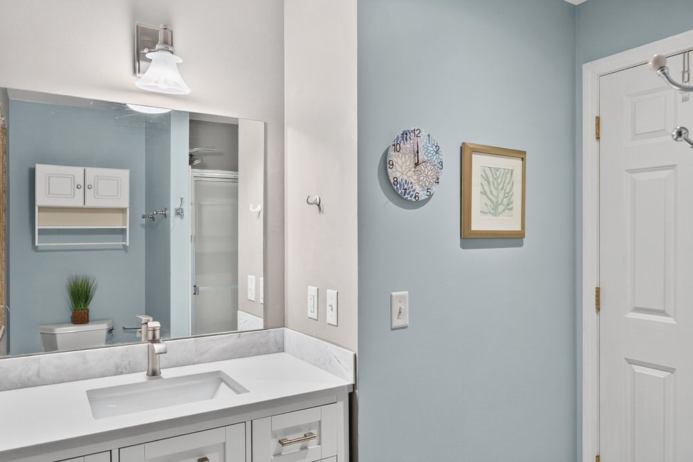 3 Stephen Hopkins Road Harwich, MA 02645 - Photo 30 of 42 a bathroom with a sink and a mirror