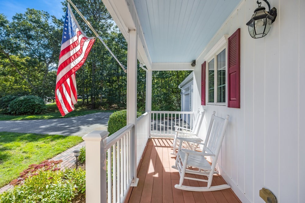 3 Stephen Hopkins Road Harwich, MA 02645 - Photo 34 of 42 a view of a chair and tables in the patio