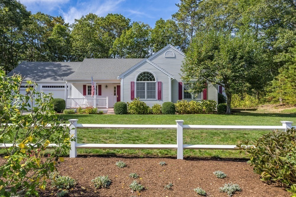 3 Stephen Hopkins Road Harwich, MA 02645 - Photo 4 of 42 a view of a house with a big yard plants and large trees