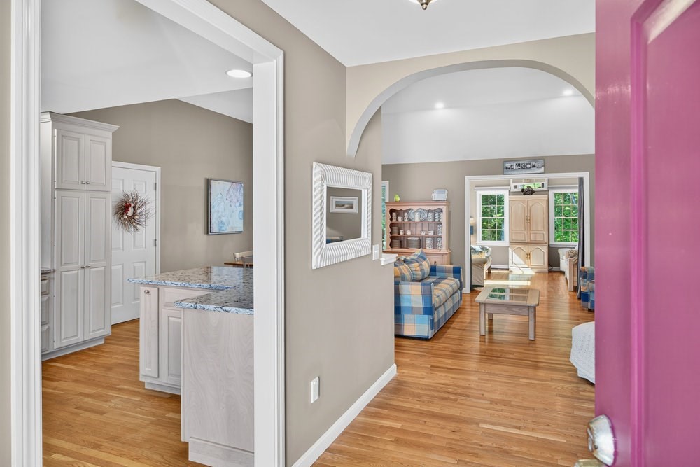 3 Stephen Hopkins Road Harwich, MA 02645 - Photo 6 of 42 a view of a living room with furniture and wooden floor