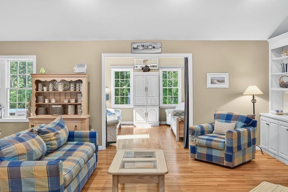 3 Stephen Hopkins Road Harwich, MA 02645 - Photo 7 of 42 a living room with furniture and a large window