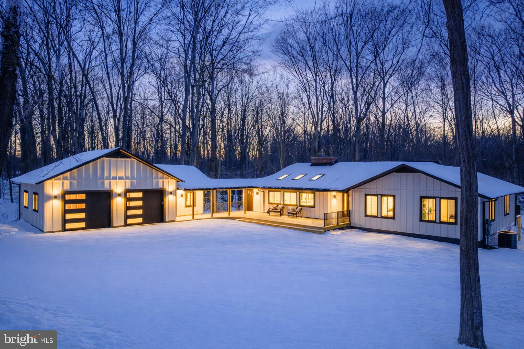 a front view of a house with a swimming pool