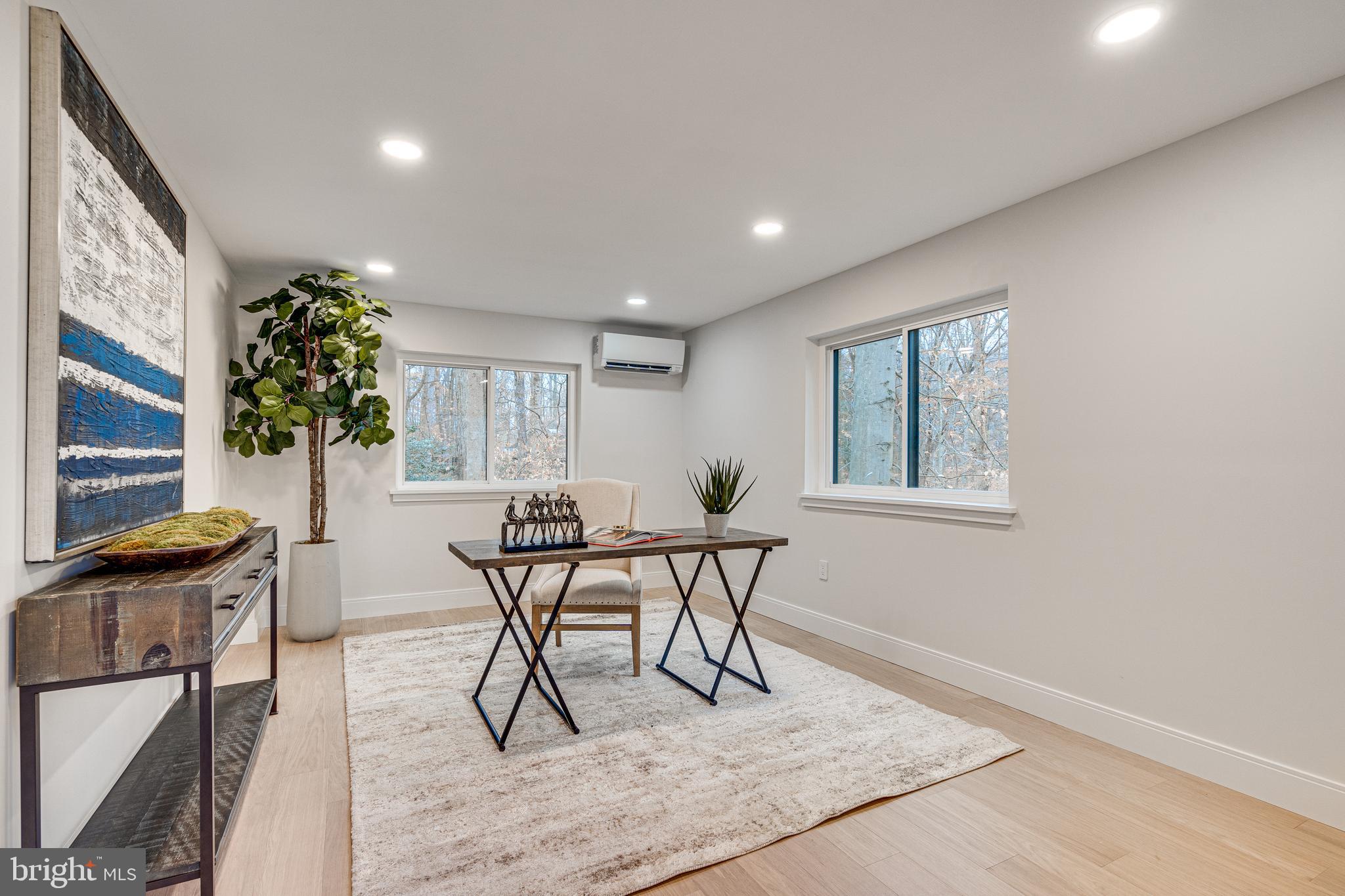 108 Interpromontory Road Great Falls, VA 22066 - Photo 12 of 93 a view of a dining room with furniture and wooden floor