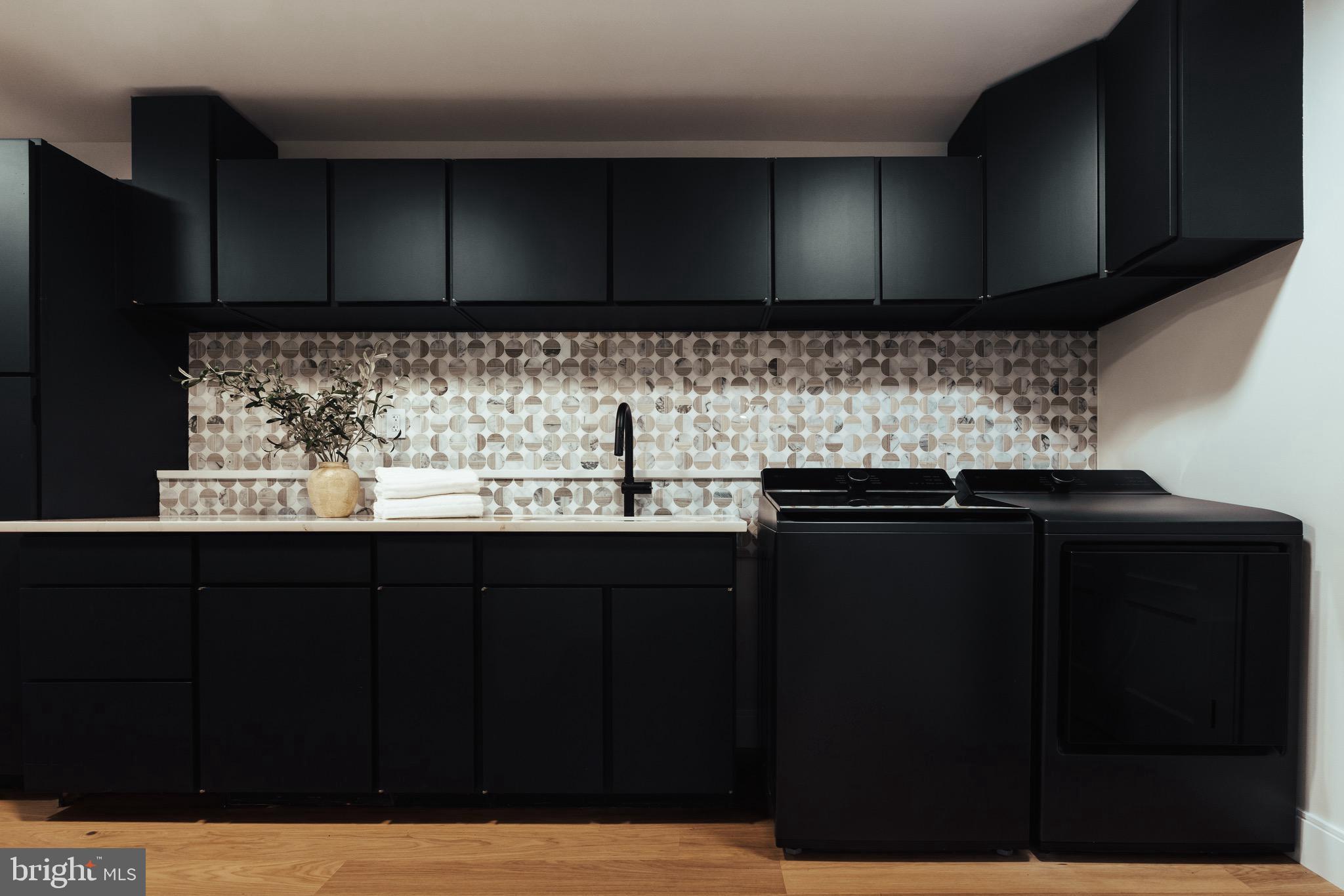 108 Interpromontory Road Great Falls, VA 22066 - Photo 18 of 108 a kitchen with a sink and cabinets