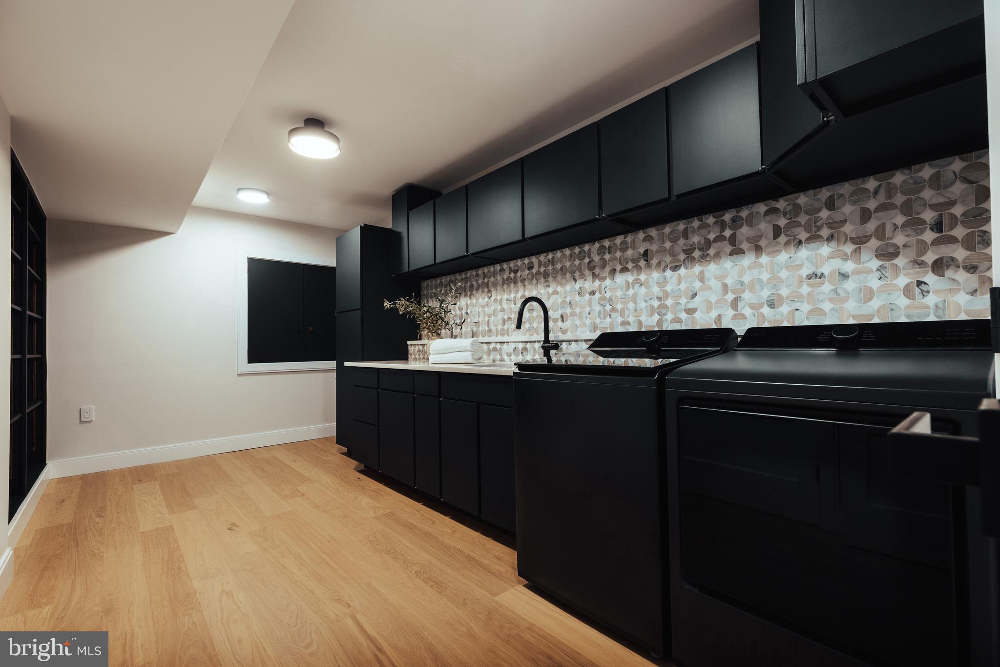 108 Interpromontory Road Great Falls, VA 22066 - Photo 19 of 108 a kitchen with a sink and cabinets