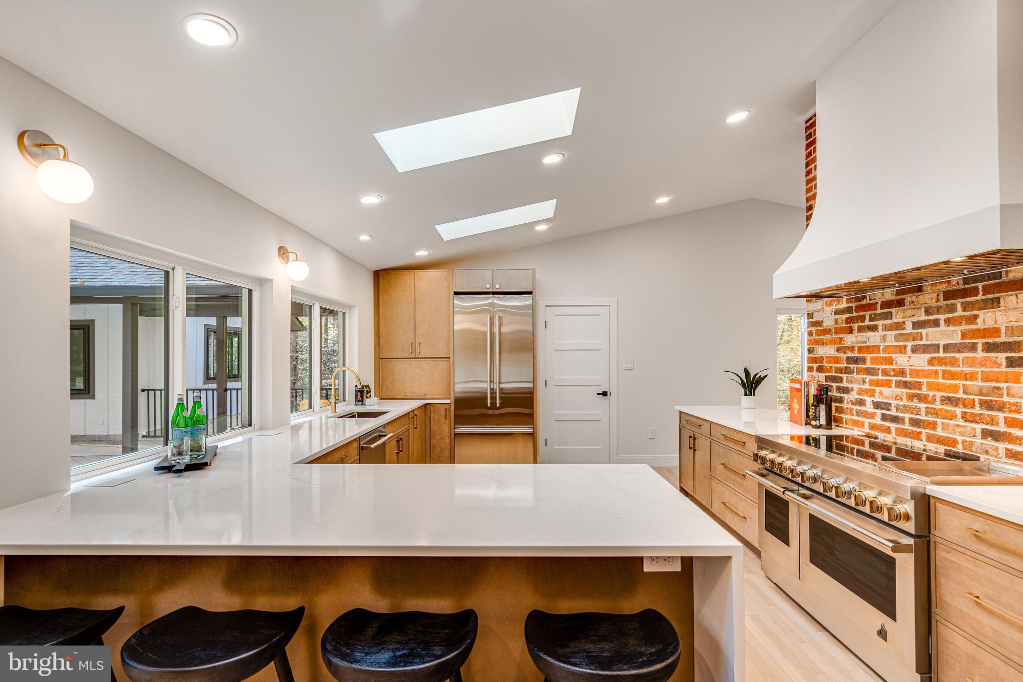 108 Interpromontory Road Great Falls, VA 22066 - Photo 2 of 93 a kitchen with counter top space and two windows